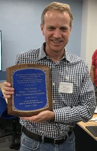 Hale Barter with plaque